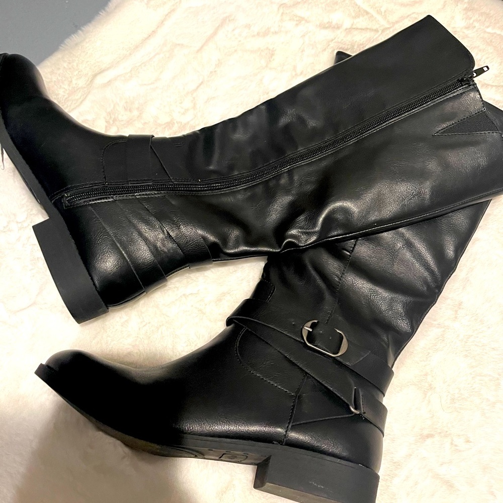 Black leather boots.